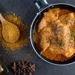 massaman-curry-frying-pan-with-spices-cement-floor_1150-20777_medium
