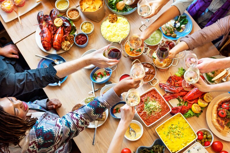 group-diverse-people-are-having-lunch-together_53876-29706_medium