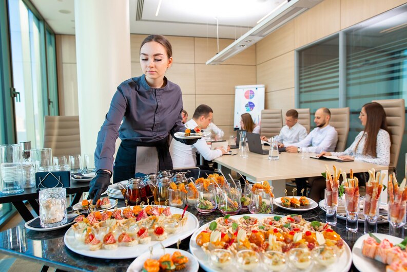restaurant-waiter-serves-offsite-banquet-officexa_110955-1602_medium