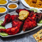 side-view-baked-chicken-with-cucumber-lemon-seasoning-bread-table
